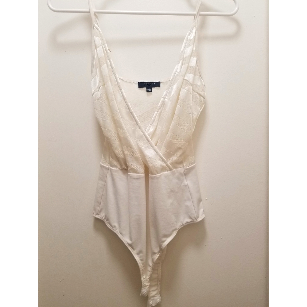 White/cream body suit